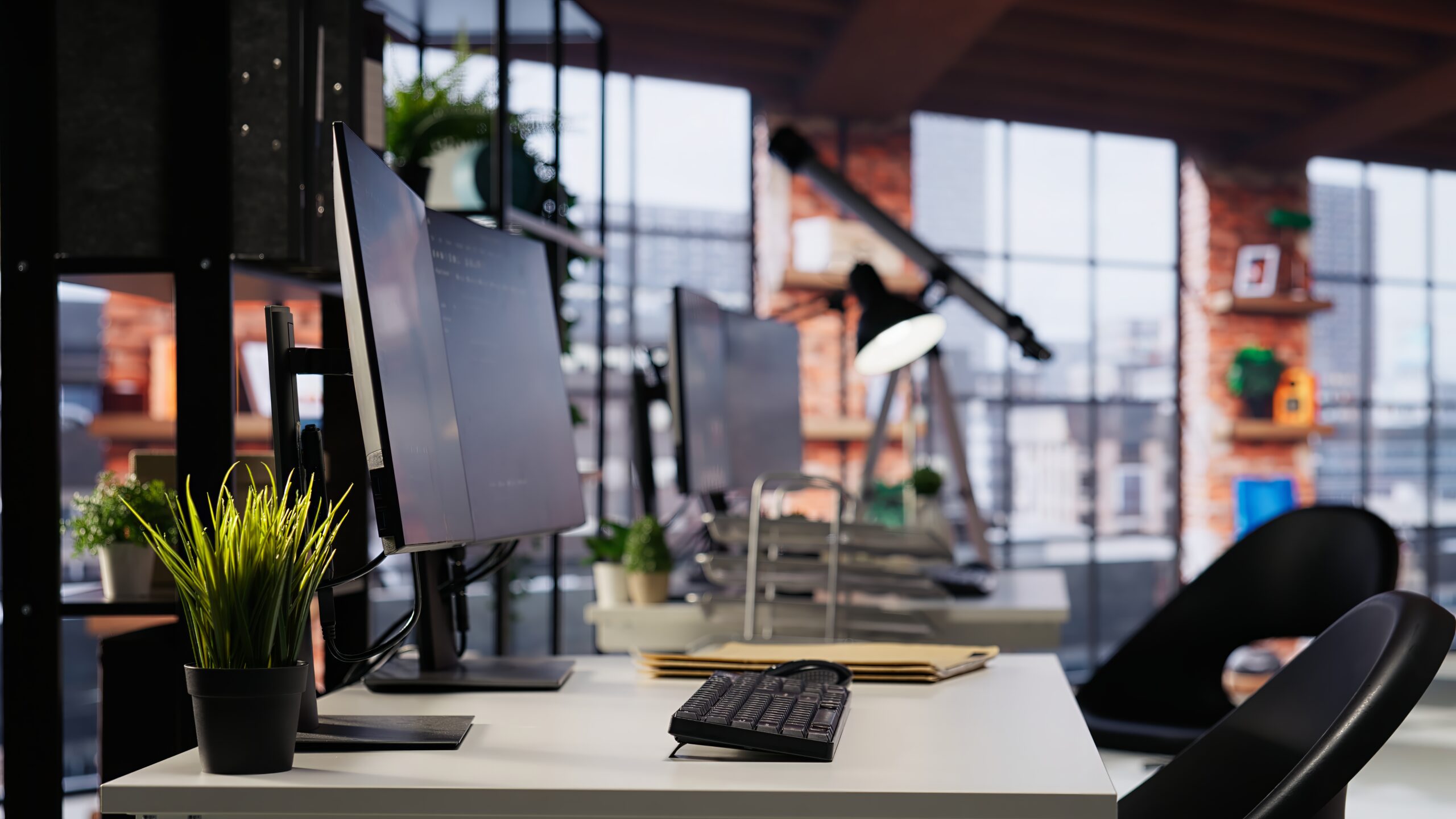 Empty Startup Office With Pc Desk Be Used By Programmers Scaled